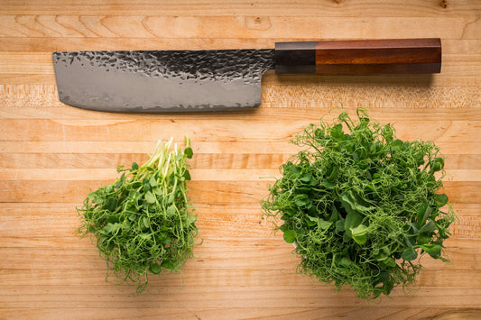 pea-shoots-harvest-knife-wood-surface.jpg